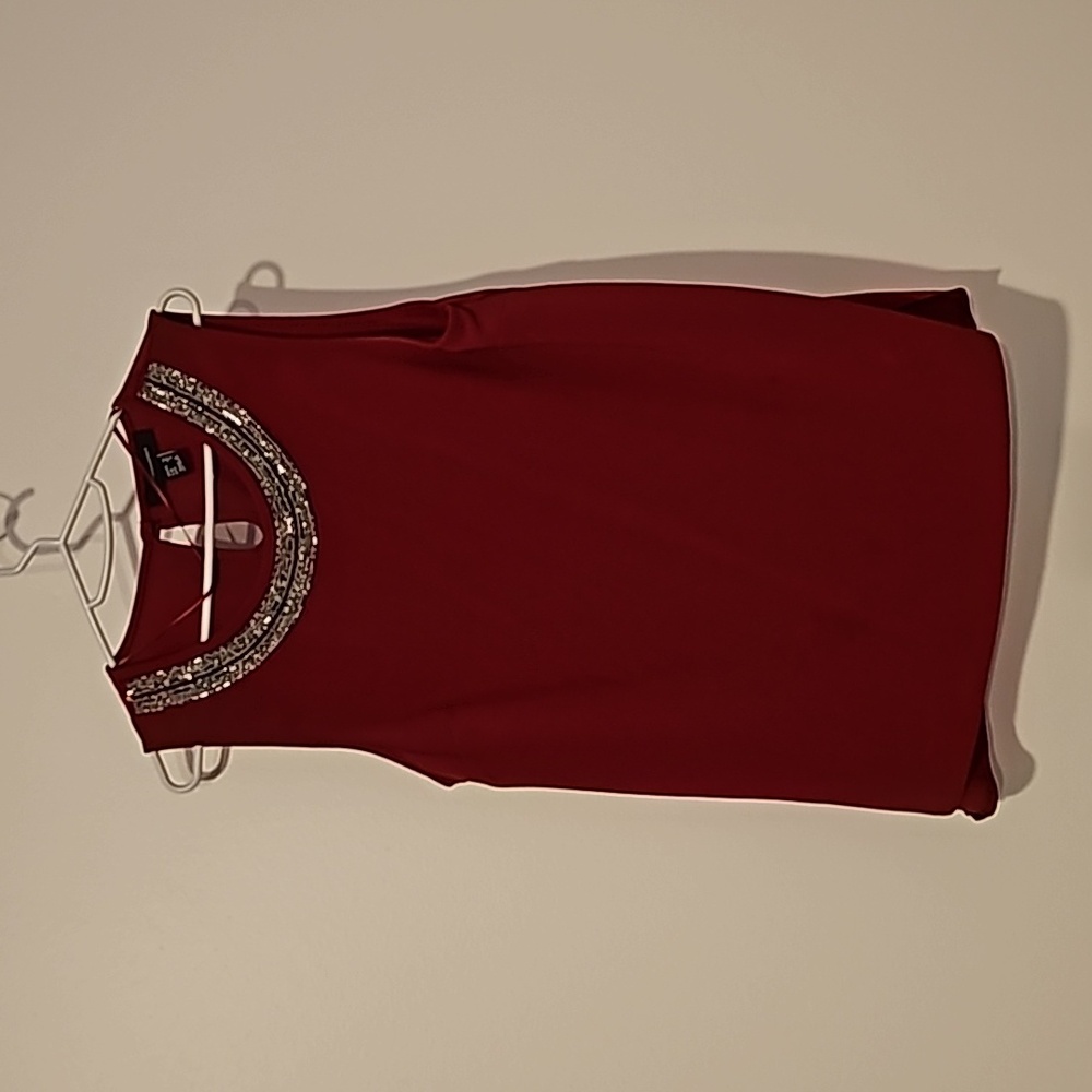 Red women's top with beaded neckline size 8